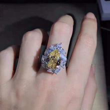 Load image into Gallery viewer, 6 Carat Pear Cut Moissanite Ring Vivid Yellow VVS 11 Stone Halo Cathedral