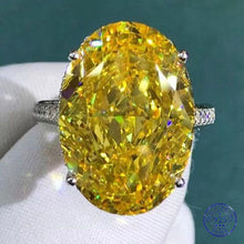 Load image into Gallery viewer, 30 Carat Oval Cut Moissanite Ring Vivid Yellow VVS Cathedral Hidden Halo Bead-set