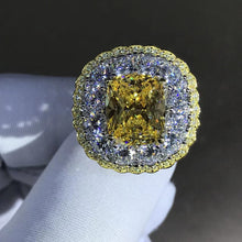 Load image into Gallery viewer, 6 Carat Cushion Cut Moissanite Ring Vivid Yellow VVS Two-tone Triple Halo