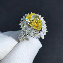 Load image into Gallery viewer, 4 Carat Pear Cut Moissanite Ring Vivid Yellow VVS Halo Starburst