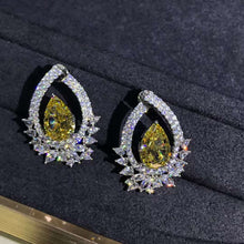 Load image into Gallery viewer, 4 Carat Pear Cut Floating Halo VVS Moissanite Stud Earrings
