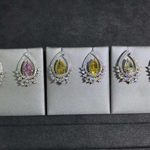 Load image into Gallery viewer, 4 Carat Pear Cut Floating Halo VVS Moissanite Stud Earrings