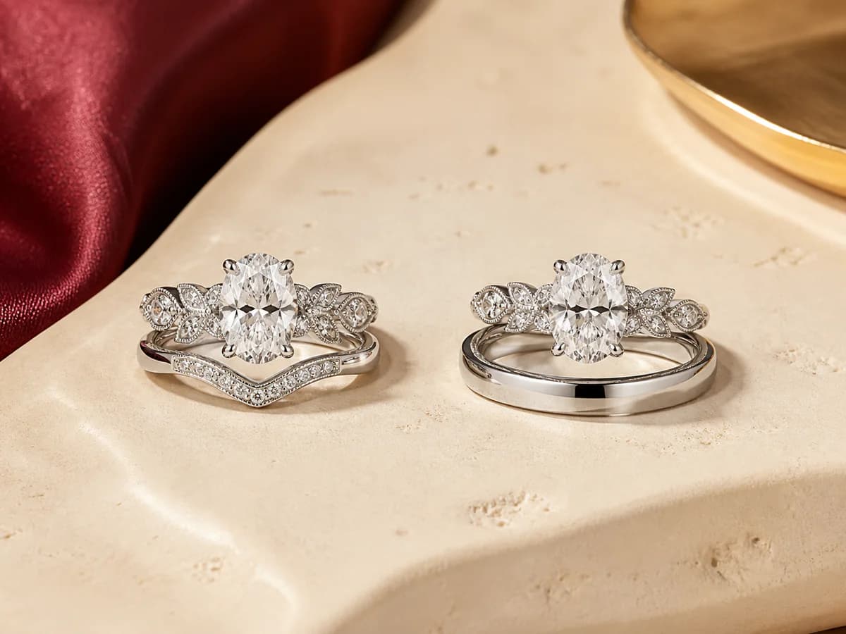 Two oval engagement-ring directions shown with a close-looking contour band and an intentionally spaced straight band.