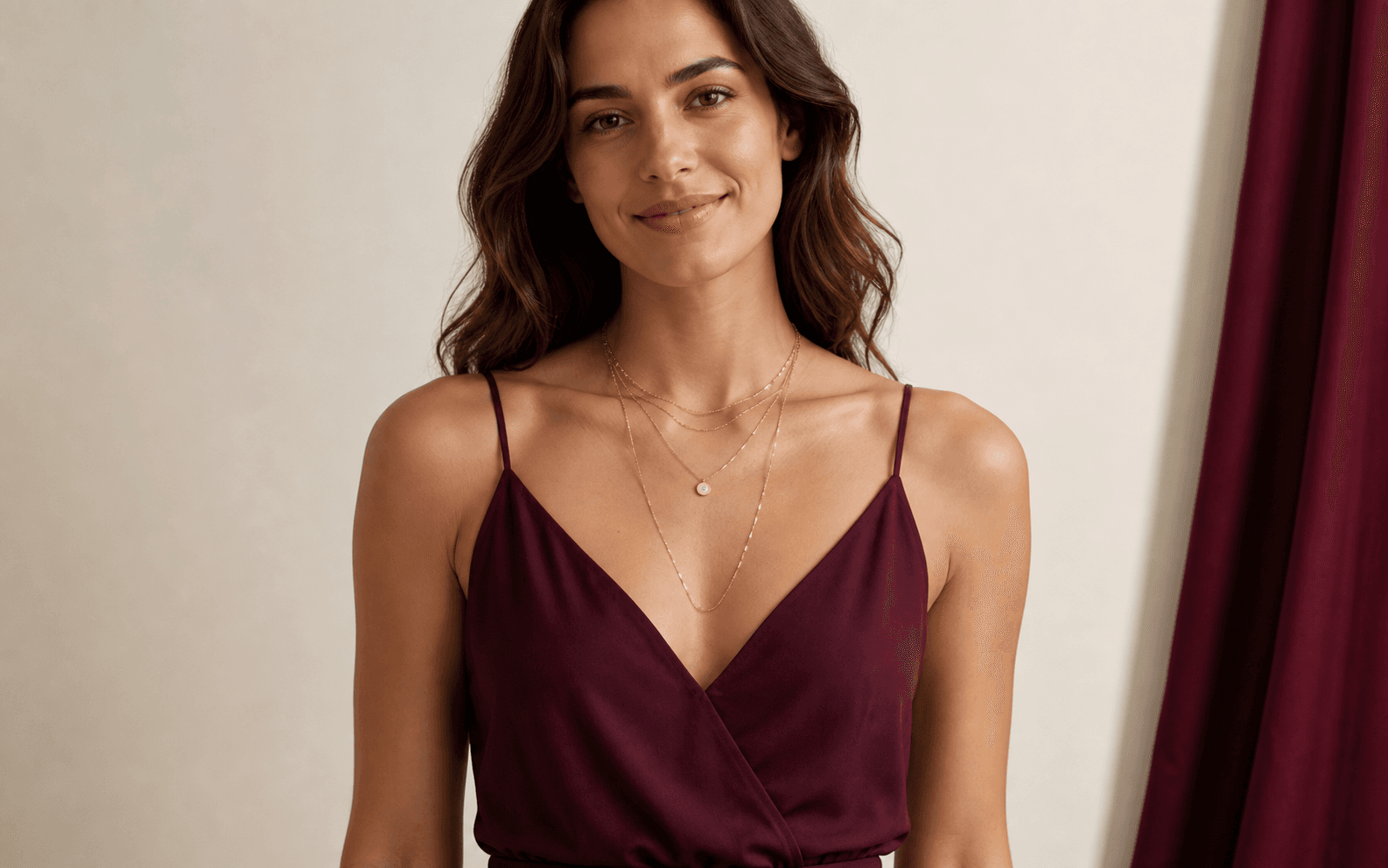 Illustrative wearer comparing four layered necklace placements
