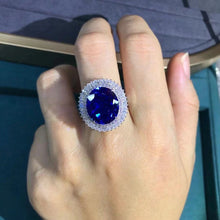 Load image into Gallery viewer, 15 Carat Oval Cut Blue Lab Grown Sapphire Snowflake Halo Ring