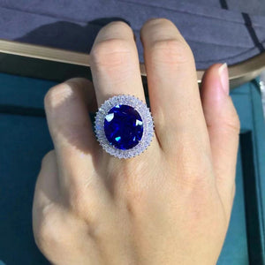 15 Carat Oval Cut Blue Lab Grown Sapphire Snowflake Halo Ring