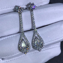 Load image into Gallery viewer, 3 Carat Pear cut K-M Colorless Halo Simulated Moissanite Dangling Earrings