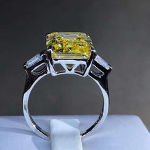 Load image into Gallery viewer, 5 Carat Emerald Cut Moissanite Ring Vivid Yellow VVS Three Stone Basket