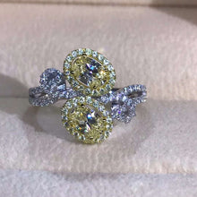 Load image into Gallery viewer, 1 Carat Oval Moissanite Ring Vivid Yellow VVS Bypass Bead-set Floating Halo Twisted Pave