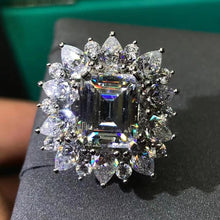 Load image into Gallery viewer, 5 Carat Emerald Cut Moissanite Ring Vivid Yellow VVS Starburst Halo