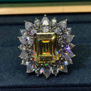 5 Carat Emerald Cut Moissanite Ring Vivid Yellow VVS Starburst Halo