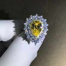 Load image into Gallery viewer, 4 Carat Pear Cut Moissanite Ring Vivid Yellow VVS Two-tone Triple Halo