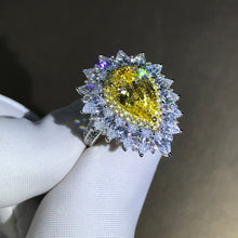 Load image into Gallery viewer, 4 Carat Pear Cut Moissanite Ring Vivid Yellow VVS Two-tone Triple Halo