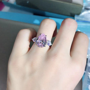 6 Carat Pink Pear Cut Three Stone VVS Moissanite Ring