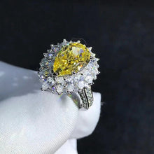 Load image into Gallery viewer, 4 Carat Pear Cut Moissanite Ring Vivid Yellow VVS Halo Starburst
