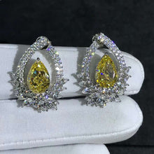 Load image into Gallery viewer, 4 Carat Pear Cut Floating Halo VVS Moissanite Stud Earrings