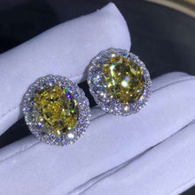 Load image into Gallery viewer, 15 Carat TW Yellow Oval Cut Halo VVS Moissanite Stud Earrings
