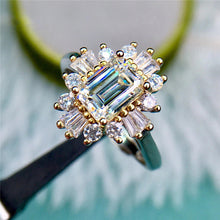 Load image into Gallery viewer, 1 Carat D Color Emerald Cut Two-tone Starburst Halo Plain Shank Moissanite Ring
