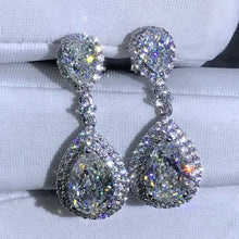 Load image into Gallery viewer, 3 Carat Pear cut Colorless Halo Simulated Moissanite Dangling Earrings