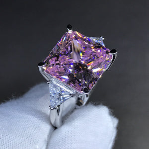 6 Carat Pink Square Radiant Cut 4 Claw Three Stone Cathedral Moissanite Ring