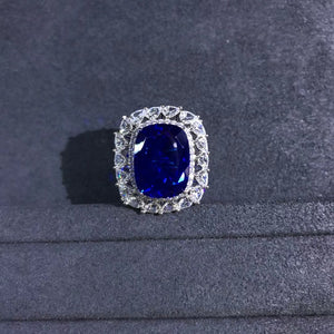 Bold 10 Carat Cushion cut Lab Sapphire Halo Ring
