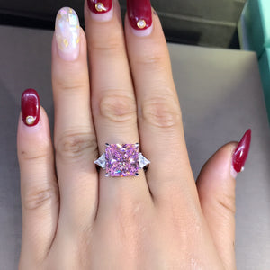 6 Carat Pink Square Radiant Cut 4 Claw Three Stone Cathedral Moissanite Ring