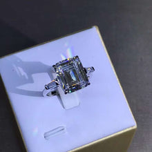 Load image into Gallery viewer, 5 Carat K-M Colorless Emerald Cut Three Stone Basket VVS Simulated Sapphire Ring