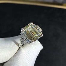 Load image into Gallery viewer, 5 Carat Emerald Cut Moissanite Ring Side Stone Plain Shank VVS K-M Colorless