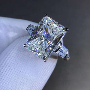 6 Carat K-M Colorless Elongated Cushion Cut Three Stone Simulated Sapphire Ring