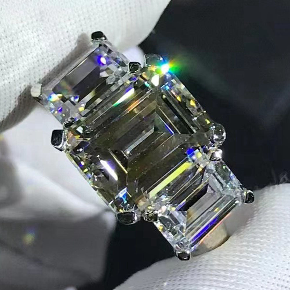 5 Carat K-M Colorless Emerald Cut Three stone Plain Shank VVS Simulated Sapphire Ring