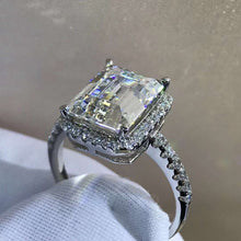 Load image into Gallery viewer, 3 Carat K-M Colorless Halo Emerald Cut French Pave VVS Simulated Sapphire Ring