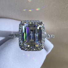Load image into Gallery viewer, 3 Carat K-M Colorless Halo Emerald Cut French Pave VVS Simulated Sapphire Ring