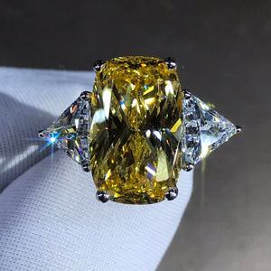 8 Carat K-M Colorless Elongated Cushion Cut Three Stone Reverse Tapered Simulated Sapphire Ring