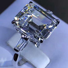 Load image into Gallery viewer, 5 Carat Emerald Cut Moissanite Ring Three Stone Basket VVS G-H Colorless