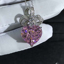 Load image into Gallery viewer, 15 Carat Yellow Heart Cut Bow Knot Halo VVS Simulated Sapphire Necklace