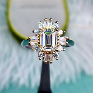 1 Carat D Color Emerald Cut Two-tone Starburst Halo Plain Shank Moissanite Ring