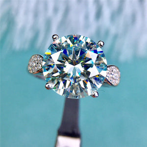 5 Carat D Color Round Cut 4 Prong Side Stone Pinched Shank VVS Moissanite Ring