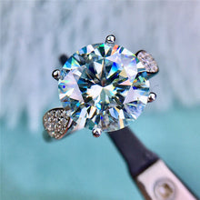 Load image into Gallery viewer, 5 Carat D Color Round Cut 4 Prong Side Stone Pinched Shank VVS Moissanite Ring
