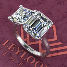 Load image into Gallery viewer, 4 Carat Medium Emerald Cut &amp; 2.6 Carat Princess Cut Two-Stone Basket D Color Moissanite Ring