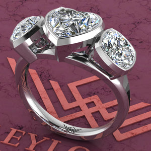 3.85 CTW Heart Cut Three-Stone Random Shape Bezel D Color Moissanite Ring