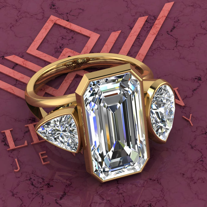 10.8 CTW Elongated Emerald Cut Three-Stone Random Shape Bezel D Color Moissanite Ring