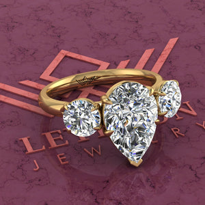 5.2 CTW Pear Cut Three-Stone D Color Basket Moissanite Ring